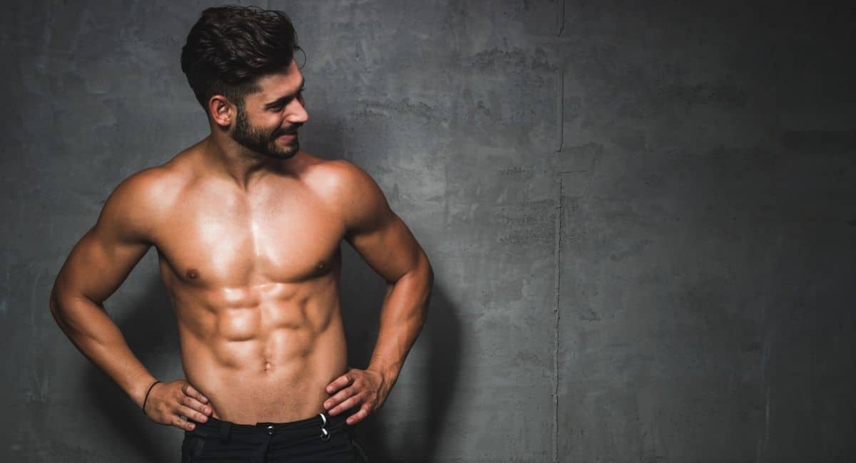 young man with beautiful abs promoting cooltone treatment