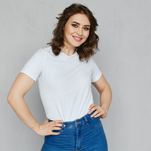 A cheerful woman showcases the exclusive perks of the THINNR weight-loss program at Admire Aesthetics in Medford and Grants Pass, OR