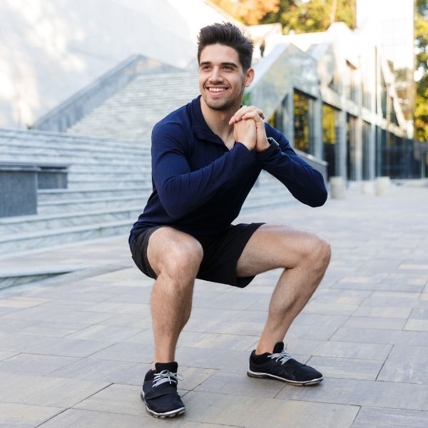 A cheerful man doing an exercise promoting the advantages of THINNR weight-loss program at Admire Aesthetics in Medford and Grants Pass, OR