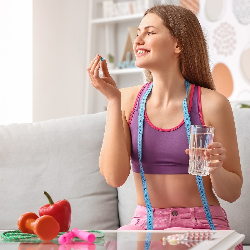 woman taking weight loss medication